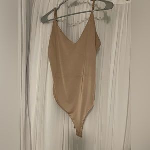 Tan smoothing bodysuit